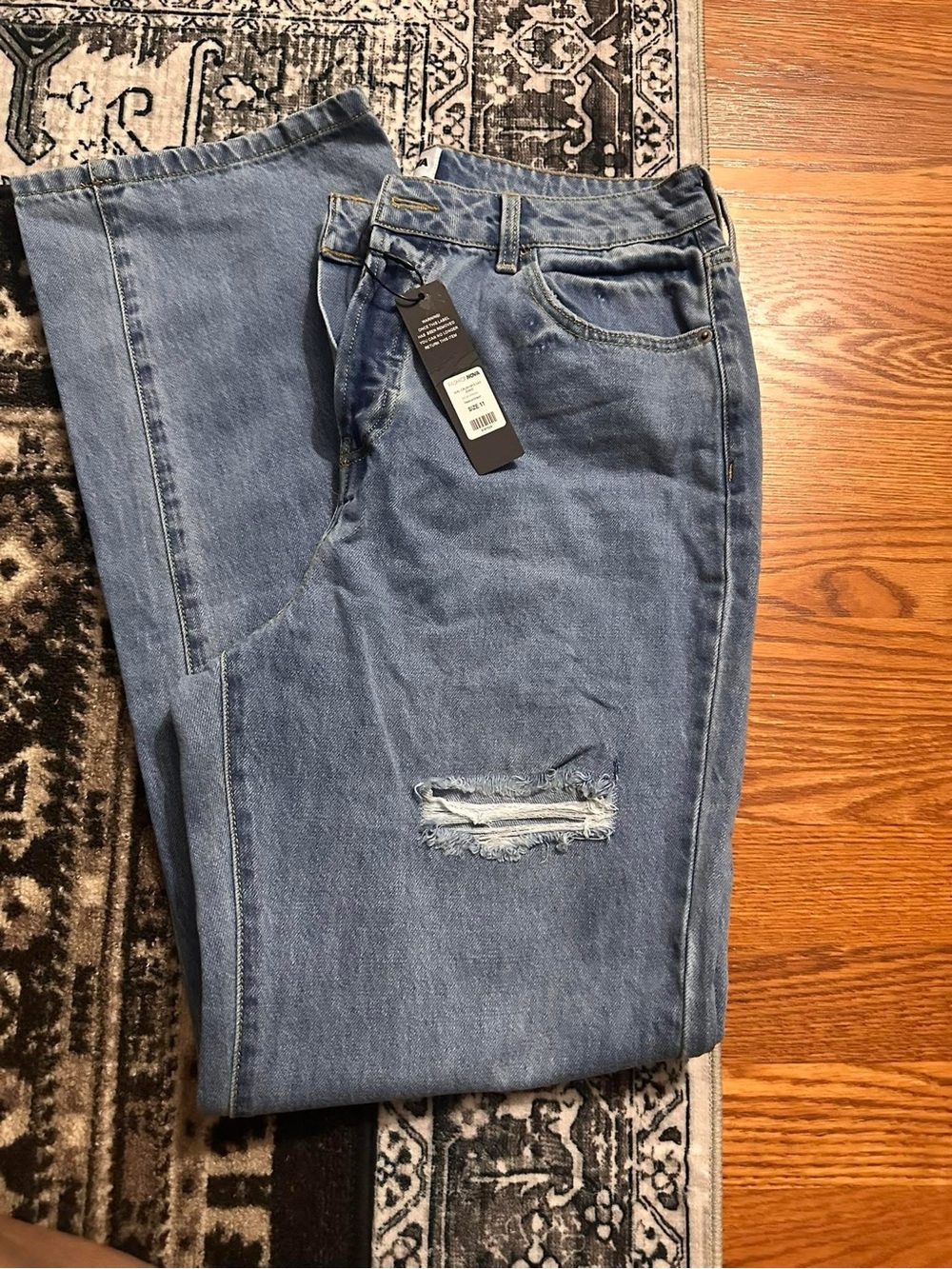 Fashion Nova Light Blue Flare Jeans with Knee Distress